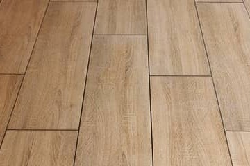 Vinyl tile with planks that look like wood.